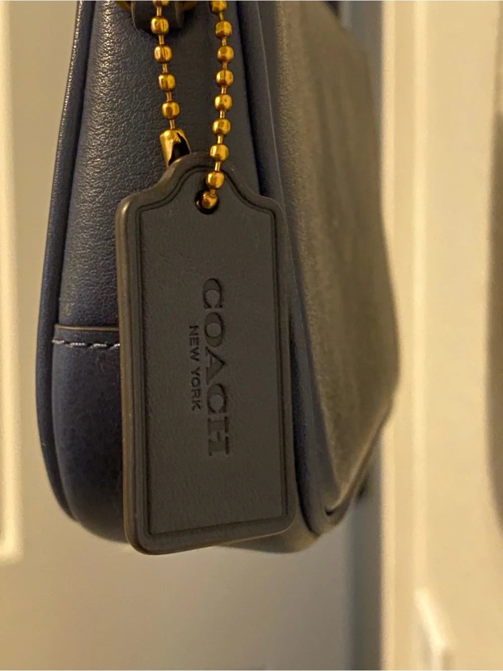 Coach Navy Pebbled Leather Mini Wristlet with Gold Hardware